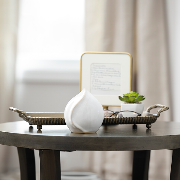 small rookwood urn on table setting