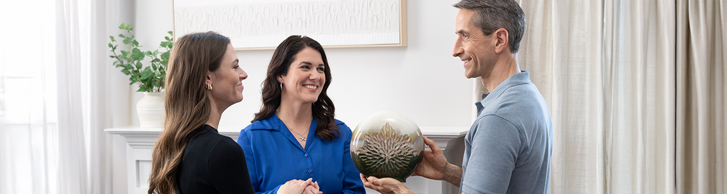 top level banner for people admiring urn